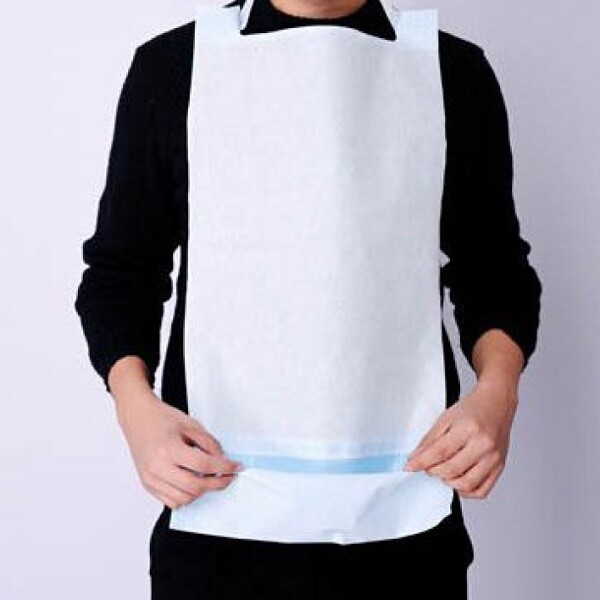 Ref. MD141 Babero desechable impermeable con bolsillo, 36x66 cm